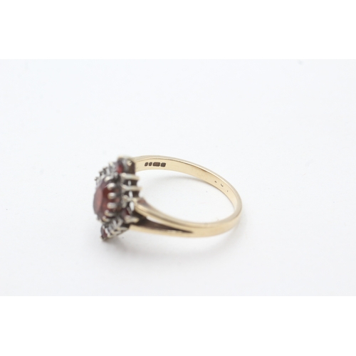 58 - 9ct gold garnet & diamond dress ring (2.9g) Size P