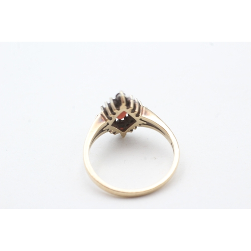 58 - 9ct gold garnet & diamond dress ring (2.9g) Size P