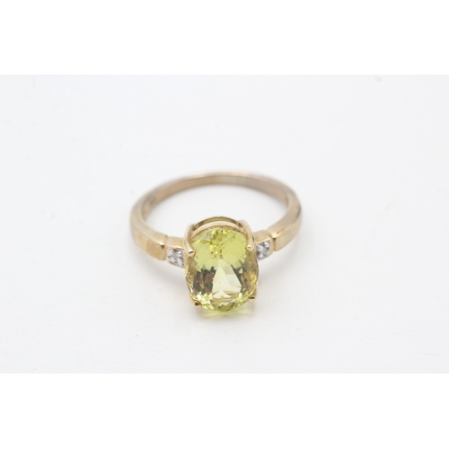 71 - 9ct gold citrine single stone ring with diamond sides (2.9g) Size N