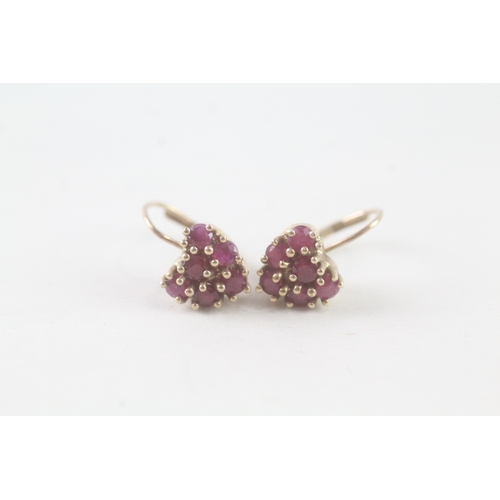 86 - 9ct gold ruby heart shaped earrings (2.2g)