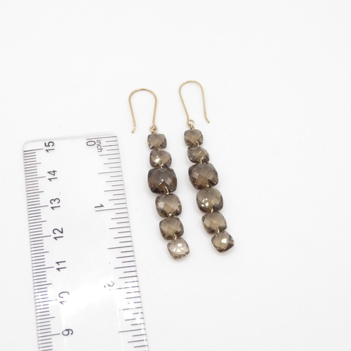 77 - 9ct gold faceted drop smokey quartz earrings with French hooks (4.1g)