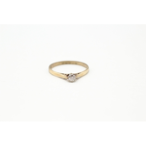 103 - 9ct gold diamond solitaire ring (1.3g) Size L 1/2