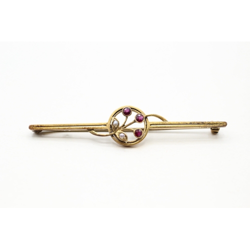 110 - 9ct gold seed pearl and red gemstone flower bar brooch (2.8g)