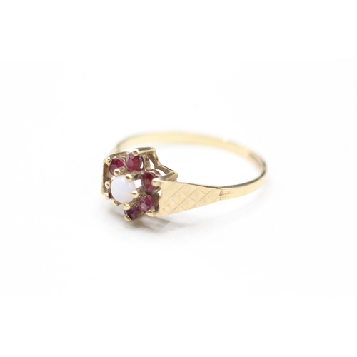 12 - 9ct gold ruby and opal halo ring (2g) Size Q