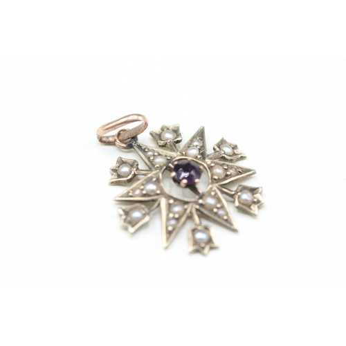 23 - 9ct gold garnet and seed pearl star pendant (1.5g)