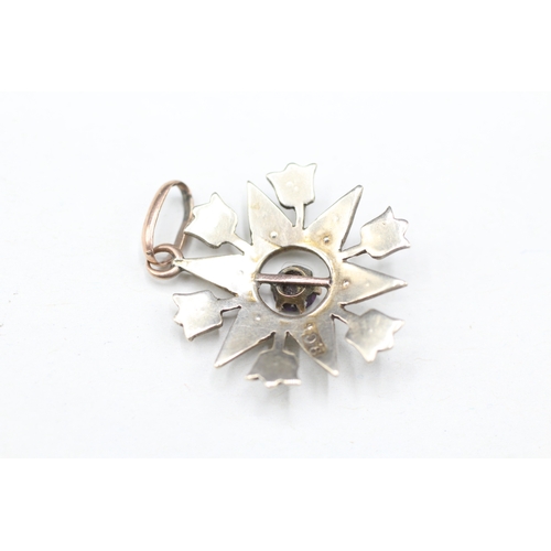 23 - 9ct gold garnet and seed pearl star pendant (1.5g)