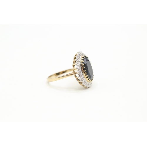 26 - 9ct gold diamond and sapphire halo ring (5.1g) Size P