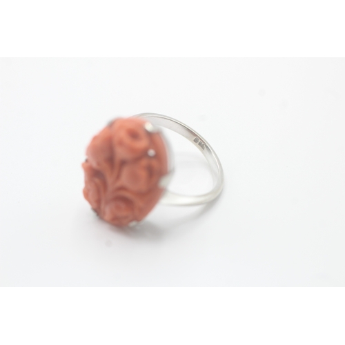 40 - 9ct white gold rose carved coral ring (4.3g) Size O