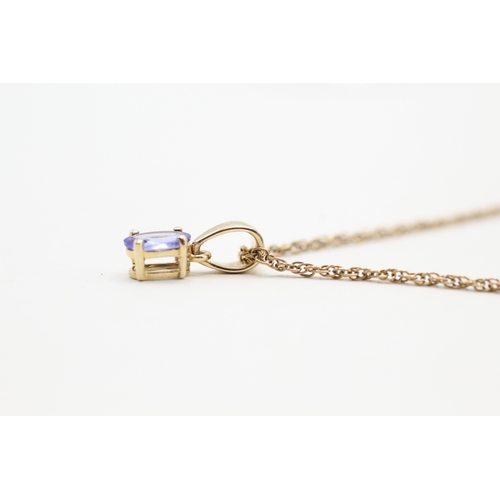 42 - 9ct gold tanzanite single stone pendant on chain (2.2g)