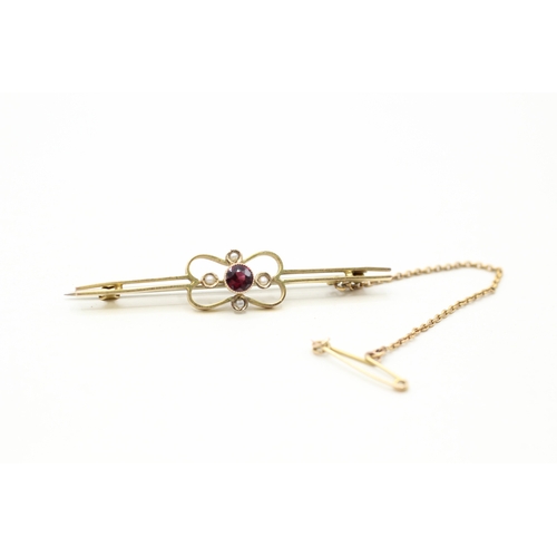 65 - 9ct gold seed pearl and garnet bar brooch (2.4g)