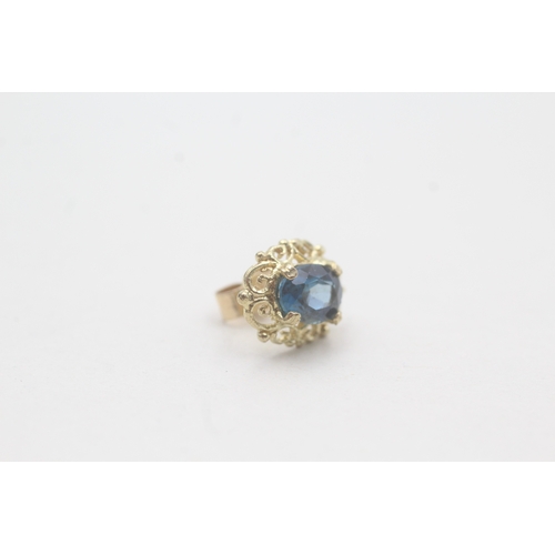 69 - 9ct gold blue topaz stud earrings (1.8g)