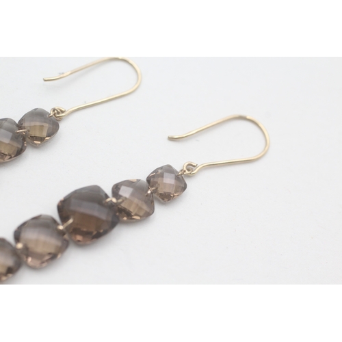 77 - 9ct gold faceted drop smokey quartz earrings with French hooks (4.1g)