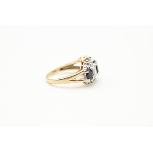 81 - 9ct gold diamond, white and blue sapphire row ring (4.2g) Size O