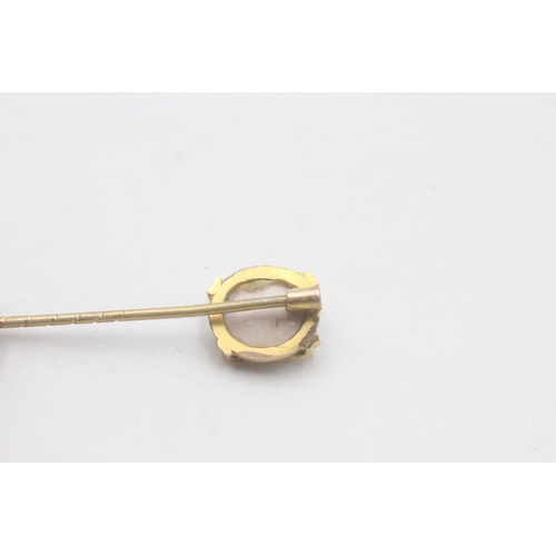 86 - 9ct gold opal stick pin with basemetal pin (1.4g)