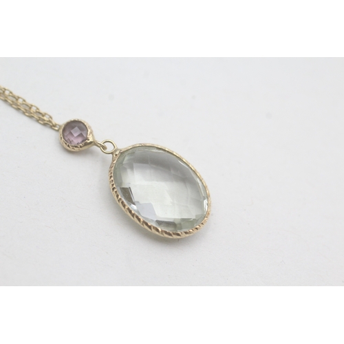 89 - 9ct gold prasiodite and amethyst pendant on chain (2.6g)