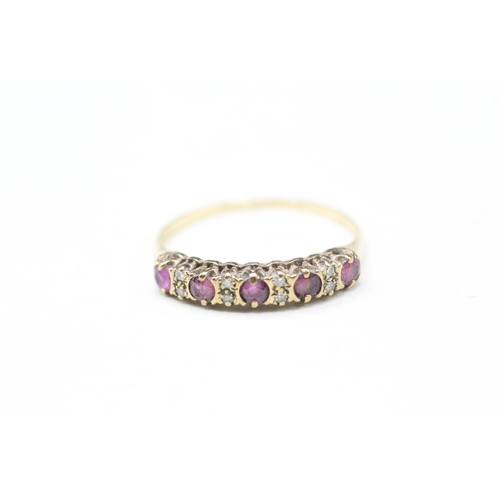 93 - 9ct gold ruby five stone ring with double diamond spacers (1.3g) Size P 1/2