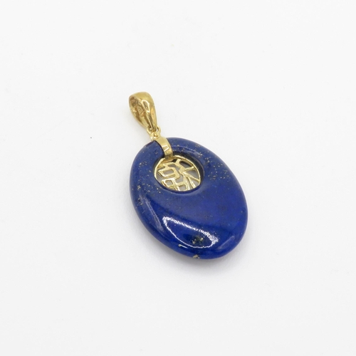 126 - 14ct gold lapis lazuli open space carved pendant (3.3g)