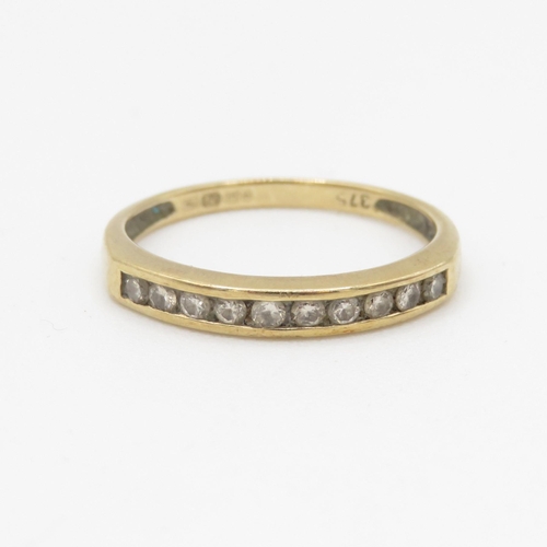 202 - 9ct gold diamond set ten stone eternity ring (1.5g) Size M 1/2