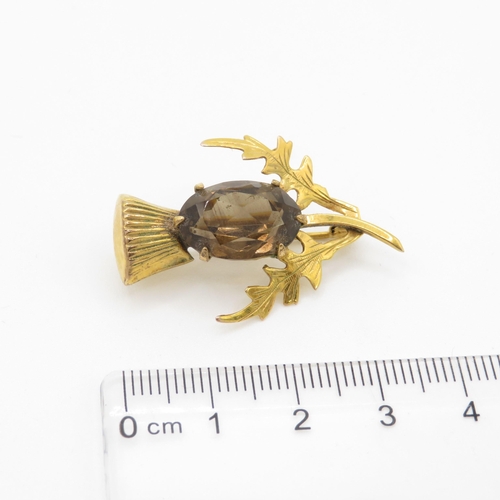 35 - 9ct gold smokey quartz thistle brooch (4g)