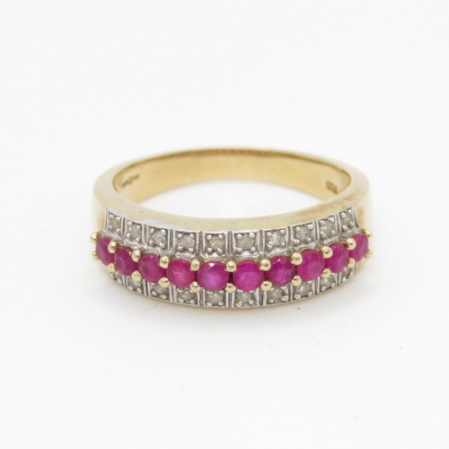 37 - 9ct gold diamond and ruby set half hoop eternity ring (4g) Size P