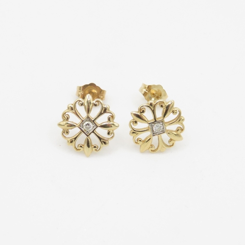 85 - 14ct gold diamond single stone floral stud earrings (2g)