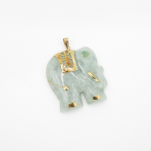 9 - 14ct gold jadite carved elephant pendant (19.4g)