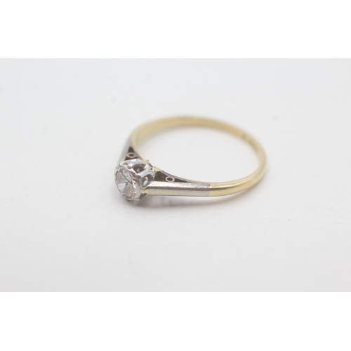 107 - 18ct gold and platinum diamond solitaire ring (1.8g) Size M