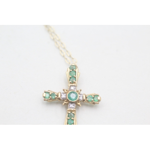 108 - 9ct gold diamond & emerald cross pendant necklace (1.6g)