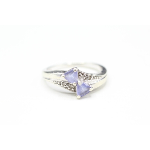 11 - 9ct white gold tanzanite and diamond twin stone ring (3.2g) Size N