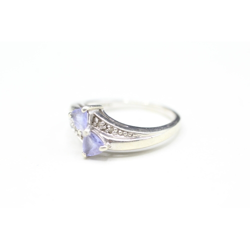 11 - 9ct white gold tanzanite and diamond twin stone ring (3.2g) Size N