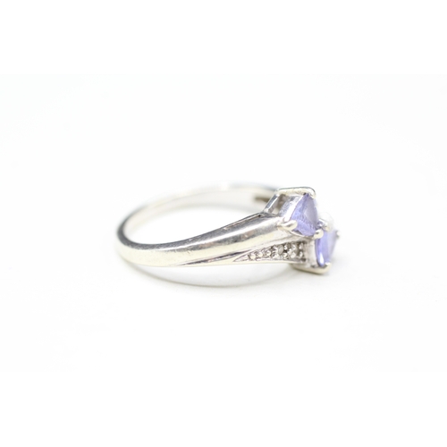 11 - 9ct white gold tanzanite and diamond twin stone ring (3.2g) Size N