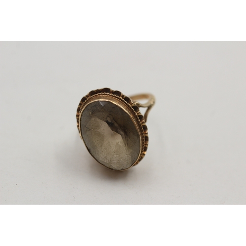 111 - 9ct gold smokey quartz single stone ring (4.9g) Size N