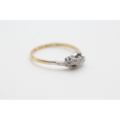 114 - 18ct gold and platinum three stone diamond ring (1.9g) Size P 1/2