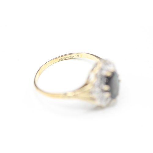 120 - 9ct gold sapphire and diamond halo ring (2.5g) Size Q