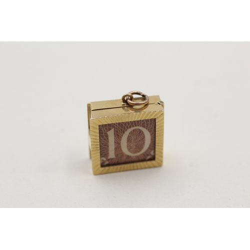 127 - 9ct gold emergency money charm (3.6g)