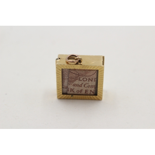 127 - 9ct gold emergency money charm (3.6g)