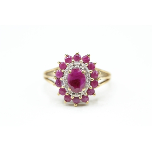 14 - 9ct gold ruby and diamond halo ring (3.5g) Size R