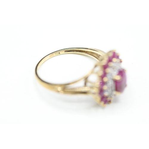 14 - 9ct gold ruby and diamond halo ring (3.5g) Size R