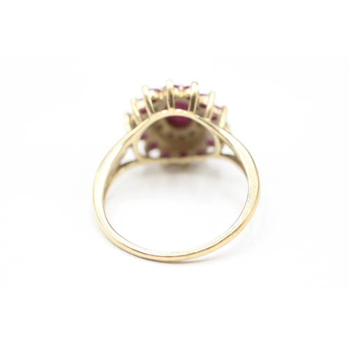 14 - 9ct gold ruby and diamond halo ring (3.5g) Size R