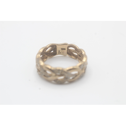 154 - 9ct gold diamond openwork dress ring (3.2g) Size L