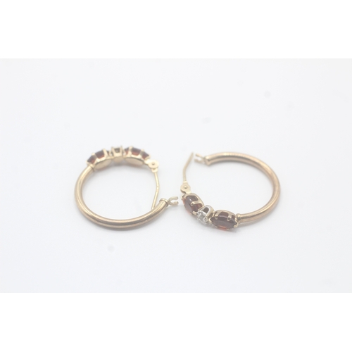 156 - 9ct gold diamond & garnet full hoop earrings (1.1g)