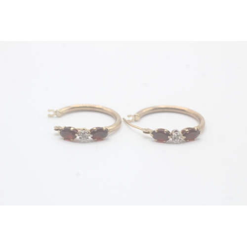 156 - 9ct gold diamond & garnet full hoop earrings (1.1g)