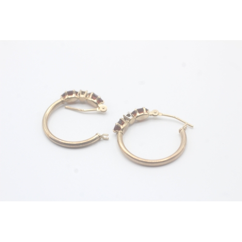 156 - 9ct gold diamond & garnet full hoop earrings (1.1g)