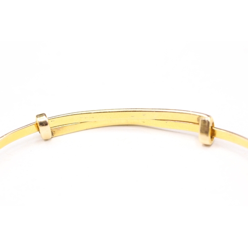 162 - 9ct gold garnet twin hand bangle (5.7g)