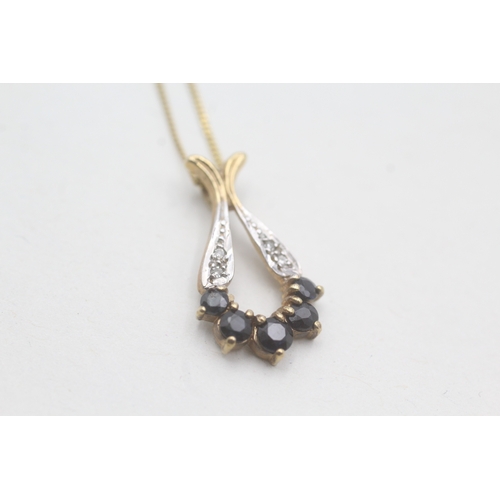 165 - 9ct gold sapphire and diamond pendant on chain (1.9g)