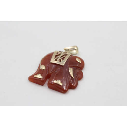 169 - 14ct gold red jade elephant pendant (5.6g)