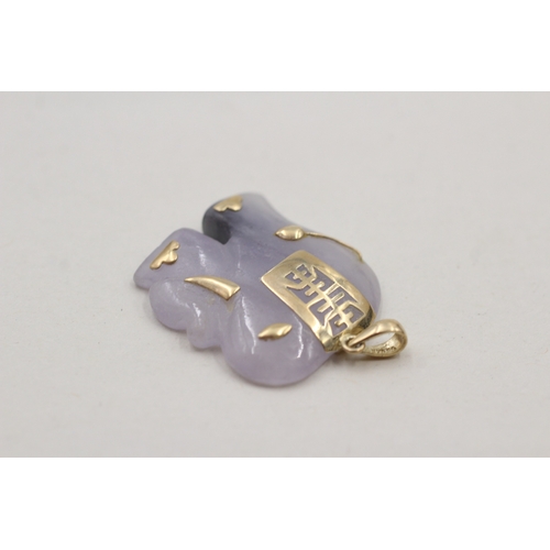 171 - 14ct gold jade elephant pendant (6g)