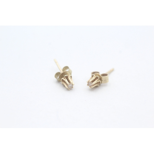 183 - 9ct gold diamond set stud earrings (0.6g)