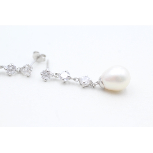 189 - 9ct white gold cultured pearl and cubic zirconia set drop earrings (3.9g)