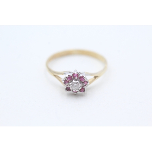 192 - 9ct gold diamond and ruby set floral cluster ring (1.7g) Size R